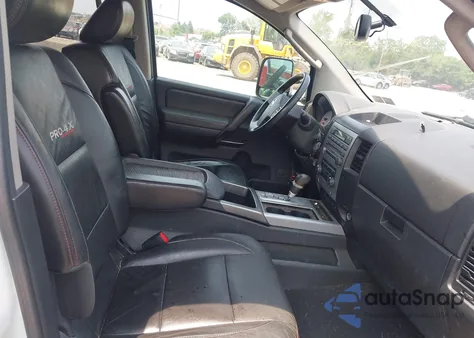 2011 Nissan Titan Pro-4X from USA, damaged, VIN 1N6AA0EC7BN305065